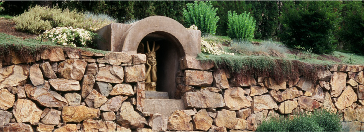 rock wall with statue